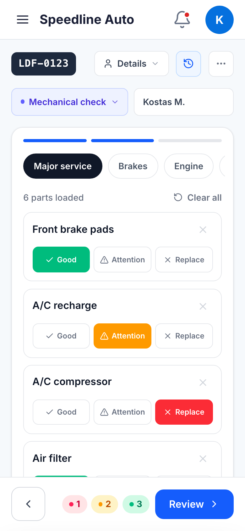 The Garaz inspection wizard on a phone — a mechanic flagging parts as Good, Attention, or Replace for Speedline Auto.